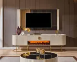Elegant tv bänk med elkamin som skapar en mysig atmosfär. Den vita möbeln med gulddetaljer passar perfekt i ett modernt hem.
