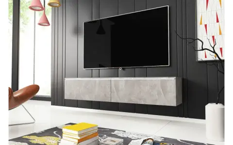 Snygg tv bänk höjd med betongliknande yta, svävande under en stor TV. En modern inredning med stil.