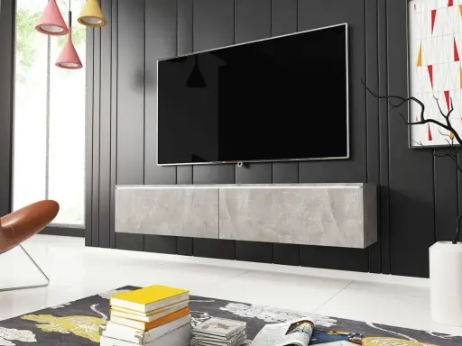 Snygg tv bänk höjd med betongliknande yta, svävande under en stor TV. En modern inredning med stil.